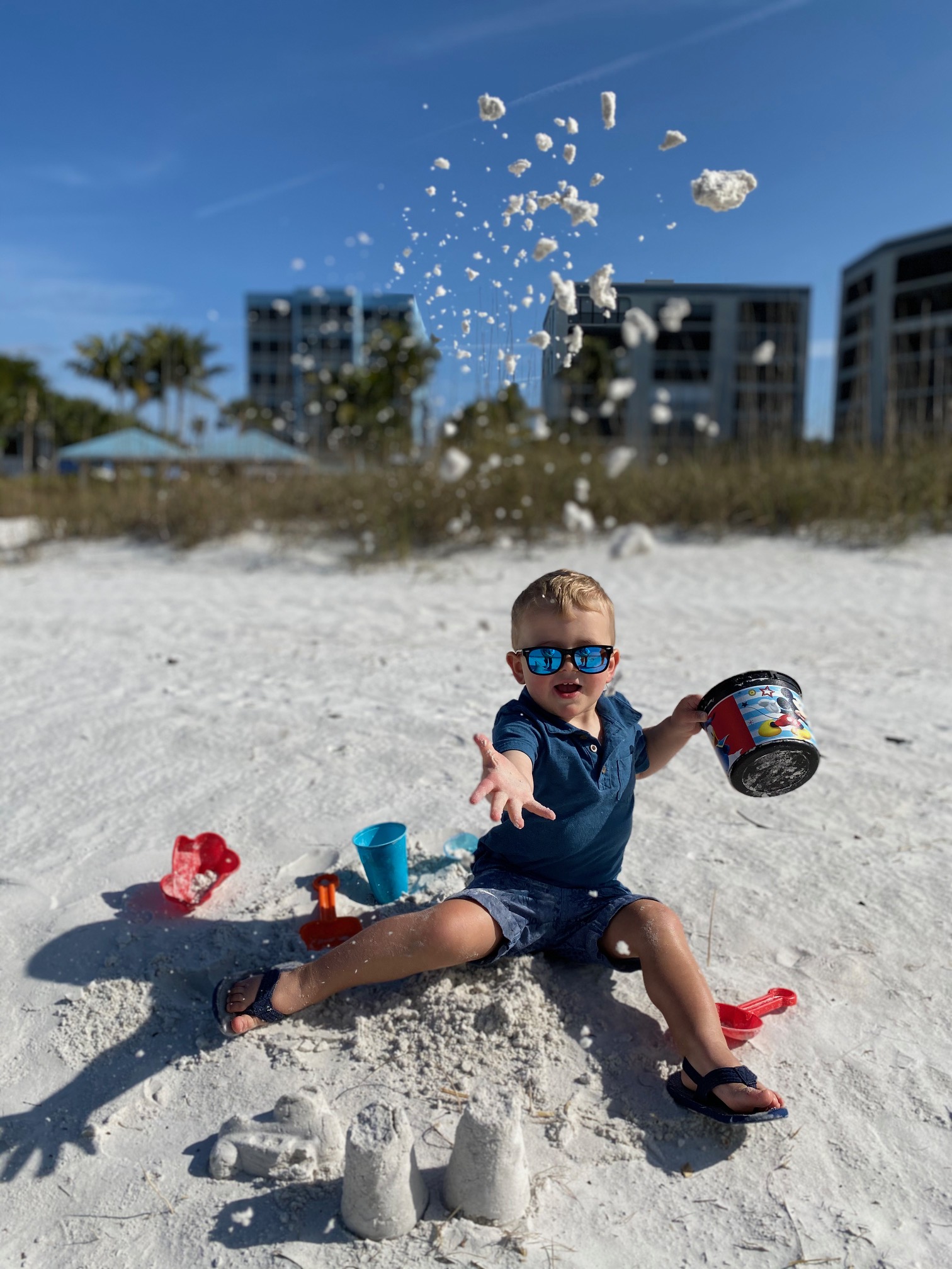 Image of Erica's nephew enjoying a beach day on Fort Myers Beach in February